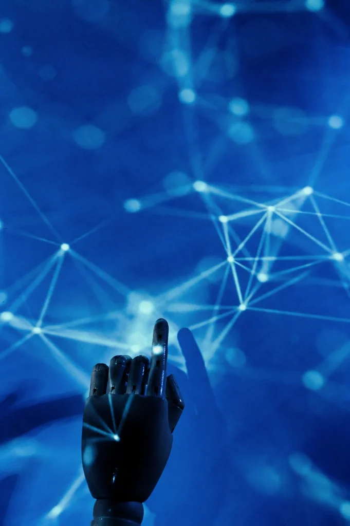 Robotic finger pointing at neural network nodes